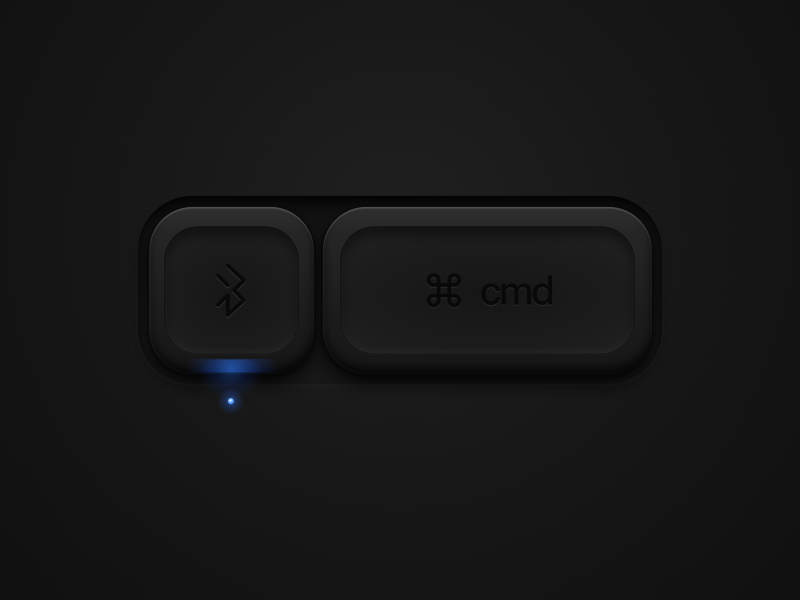 First Paper pass at the Bluetooth and Command key pair, with a blue lamp under the left cap.